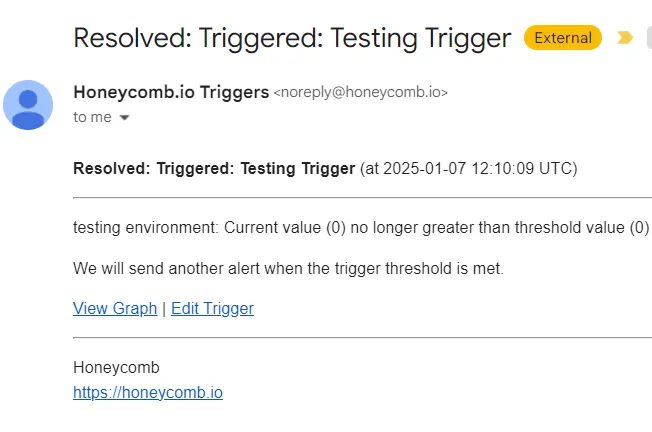 A resolved alert email from Honeycomb